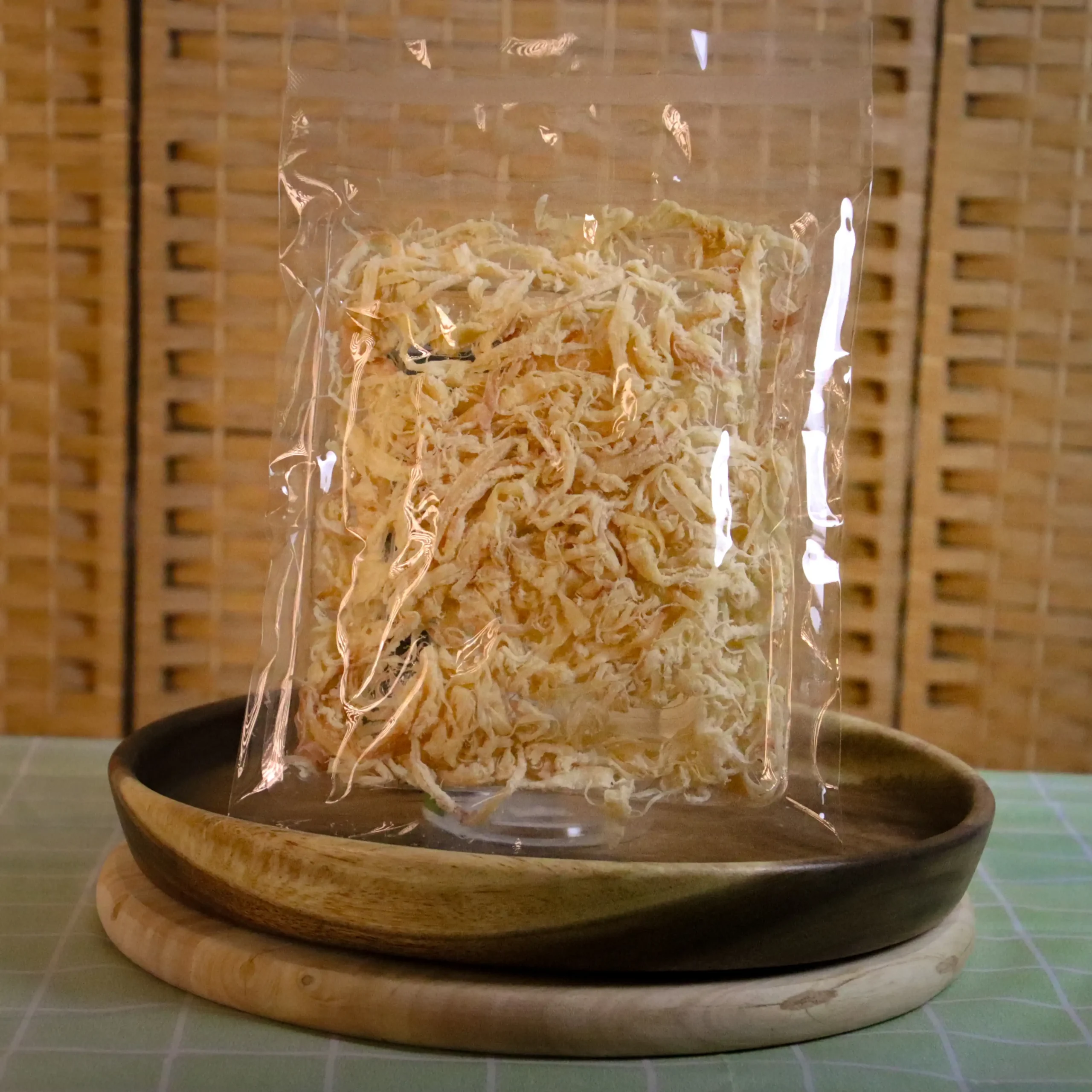 ปลาหมึกหยองอบเนย